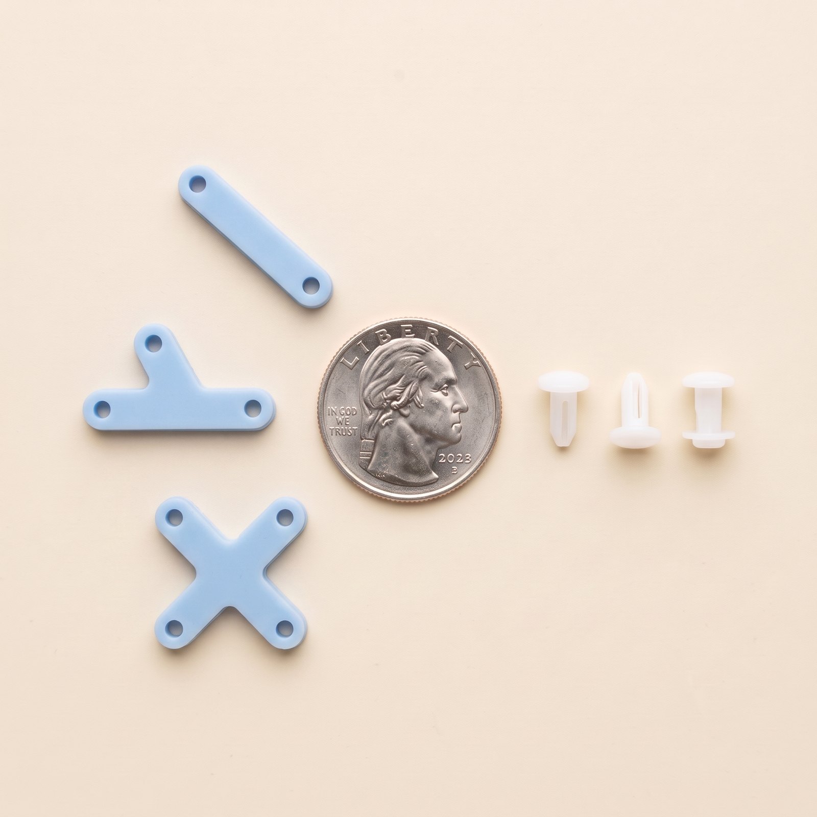 Bar, Y and X pieces in sky blue with three holders and a quarter